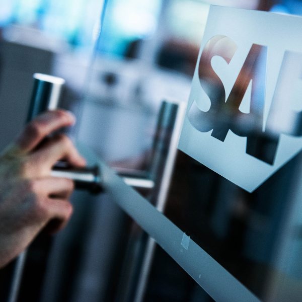 A sign sits on a glass door inside the SAP SE office in Budapest, Hungary, on Tuesday, Oct. 20, 2015. SAP shares rose 0.2 percent to 66.28 euros at 12:24 p.m. in Frankfurt, for a gain this year of 14 percent. Photographer: Akos Stiller/Bloomberg